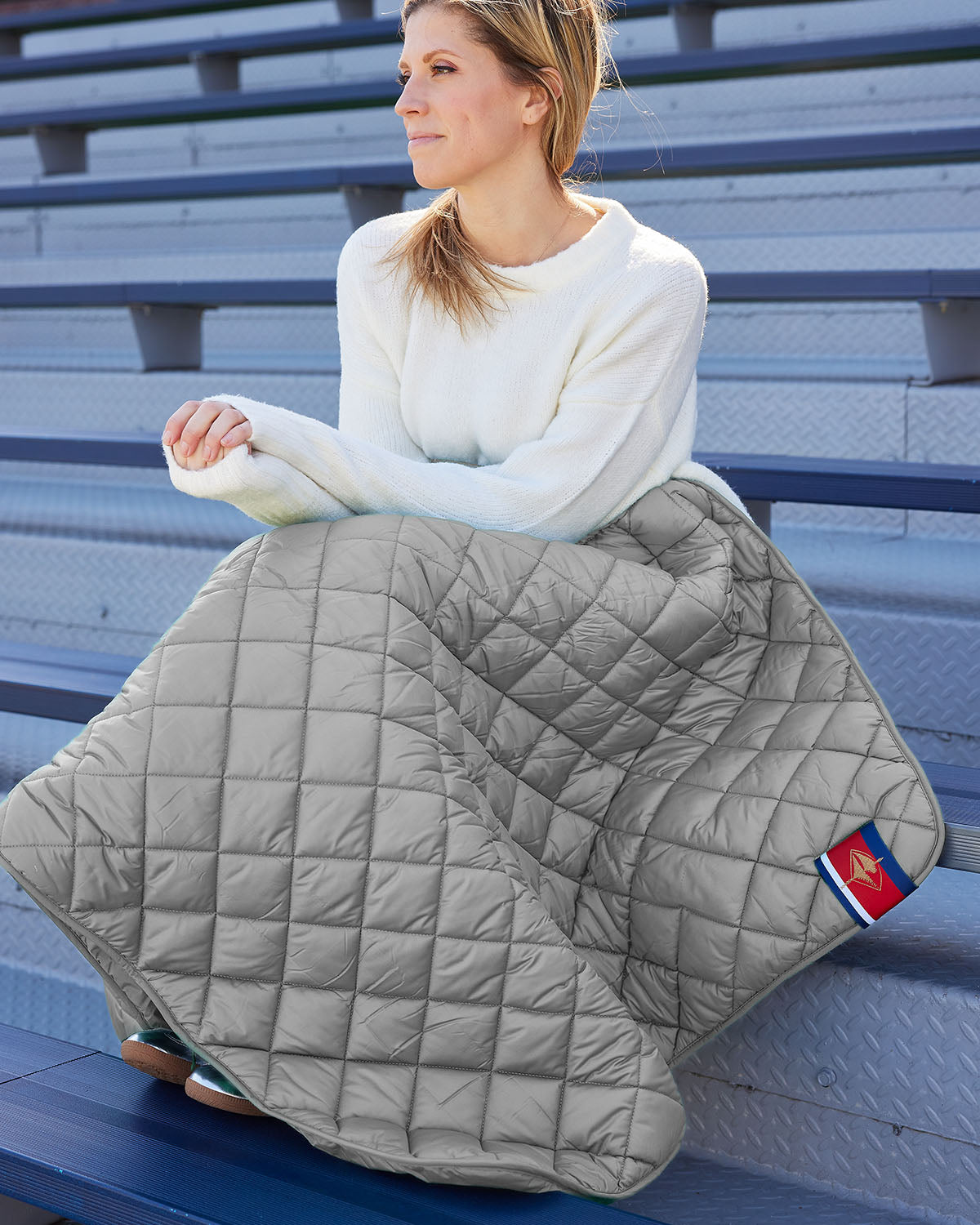 Snuggles: Waterproof Puffer Blanket with Pockets