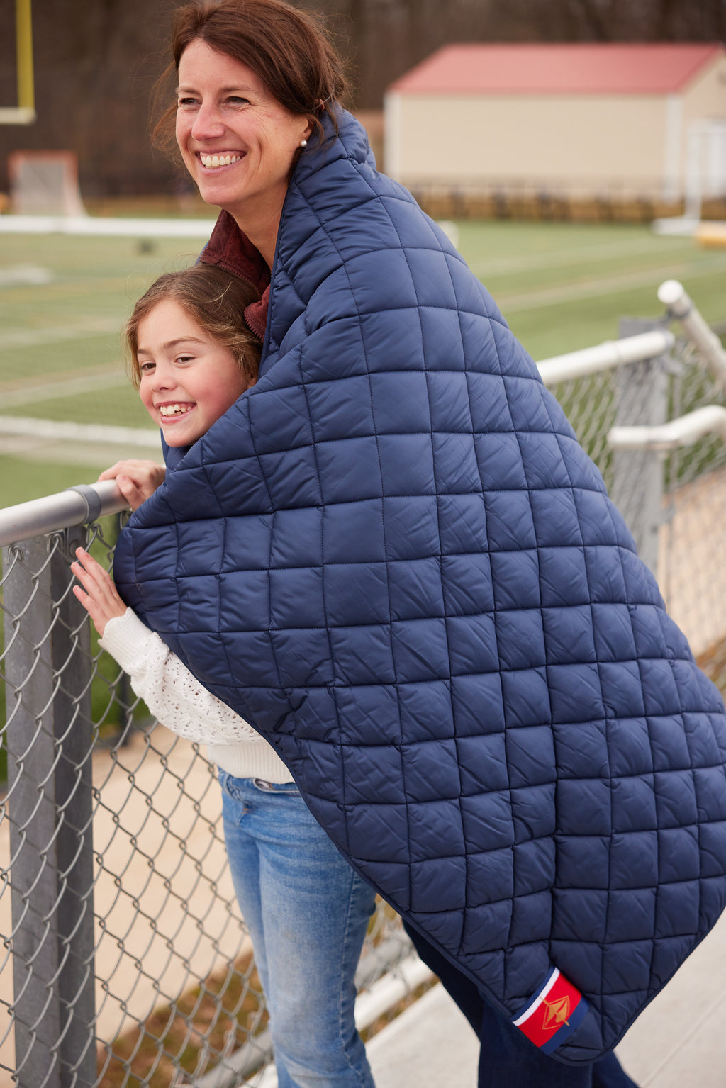 Snuggles: Waterproof Puffer Blanket with Pockets