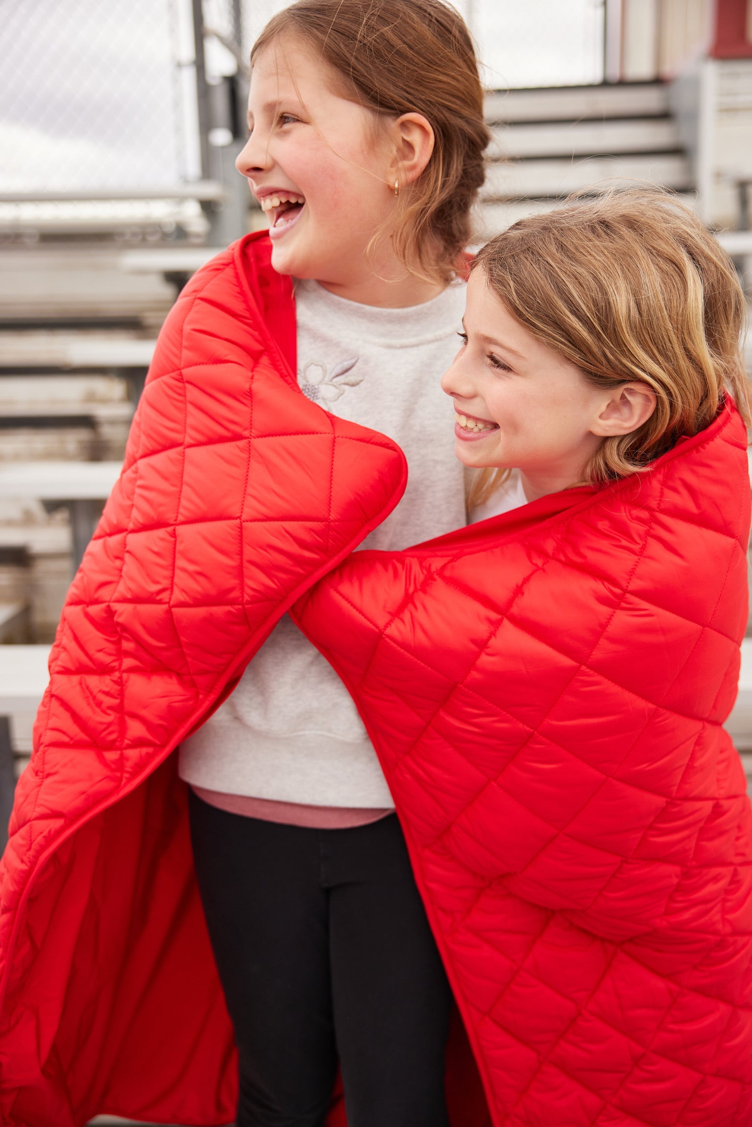 Snuggles: Waterproof Puffer Blanket with Pockets