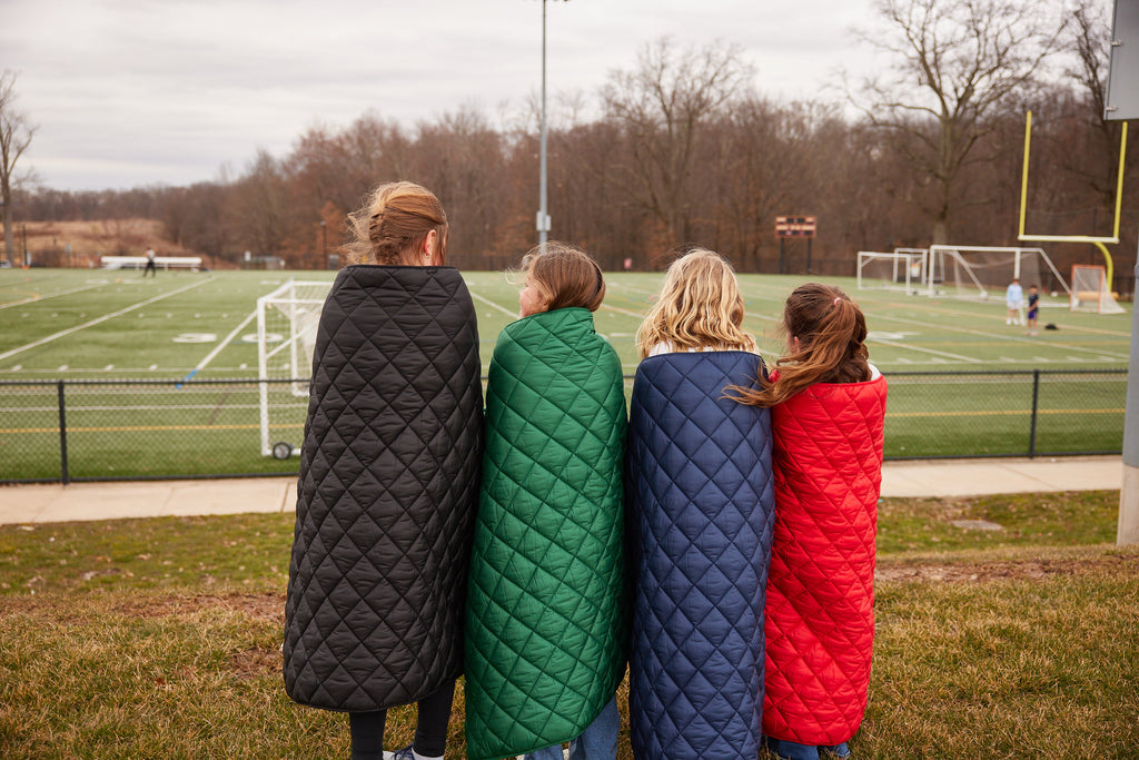 Snuggles: Waterproof Puffer Blanket with Pockets