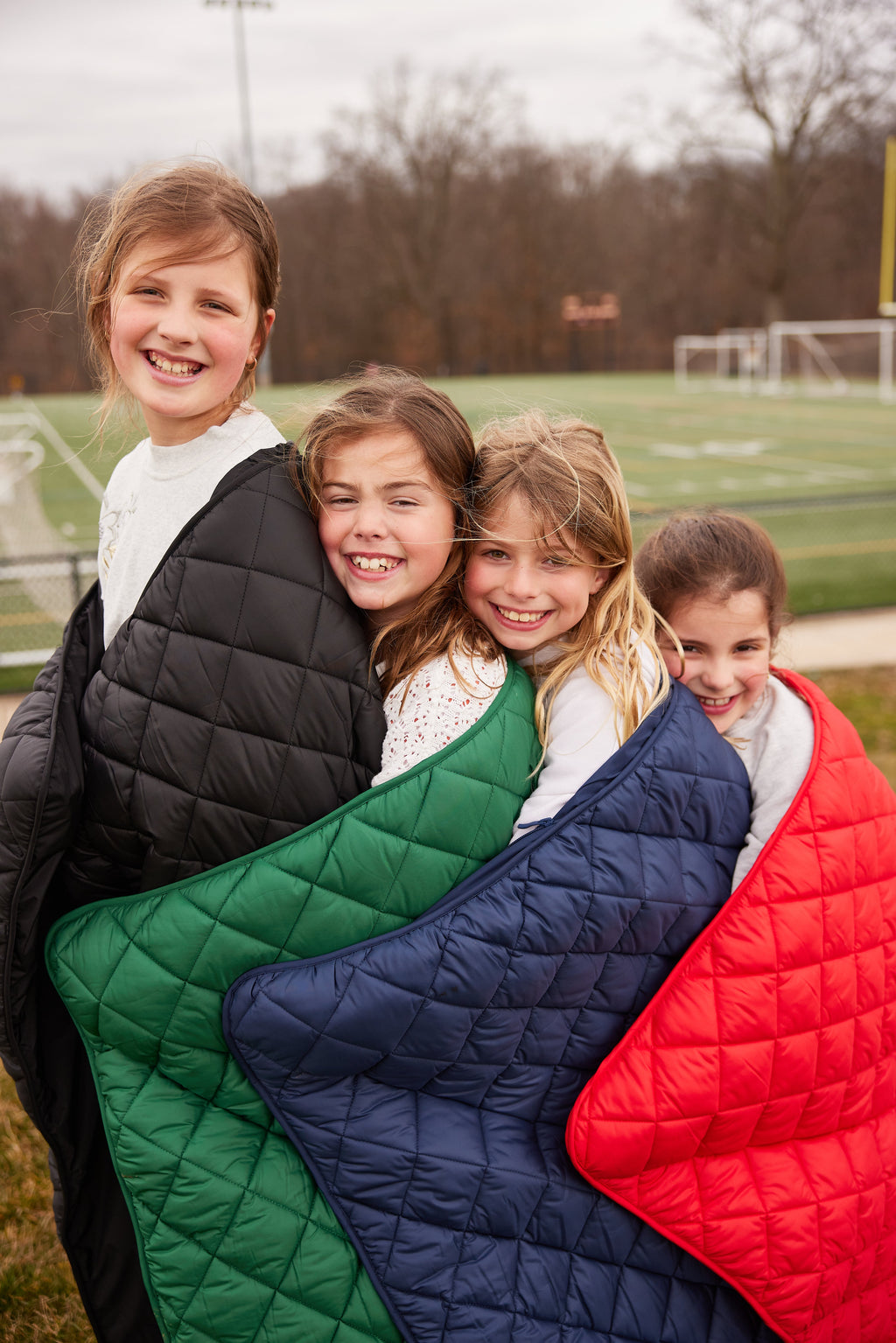 Snuggles: Waterproof Puffer Blanket with Pockets
