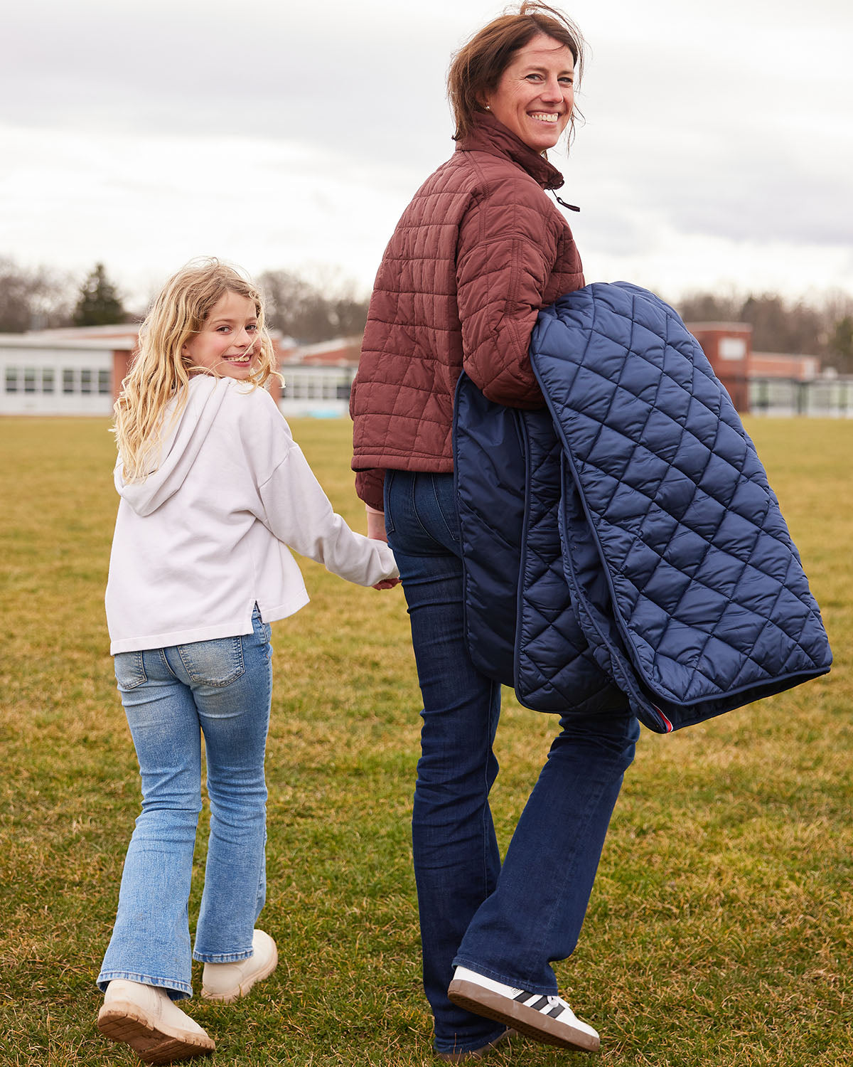 Snuggles: Waterproof Puffer Blanket with Pockets