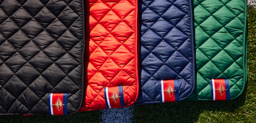 Snuggles: Waterproof Puffer Blanket with Pockets