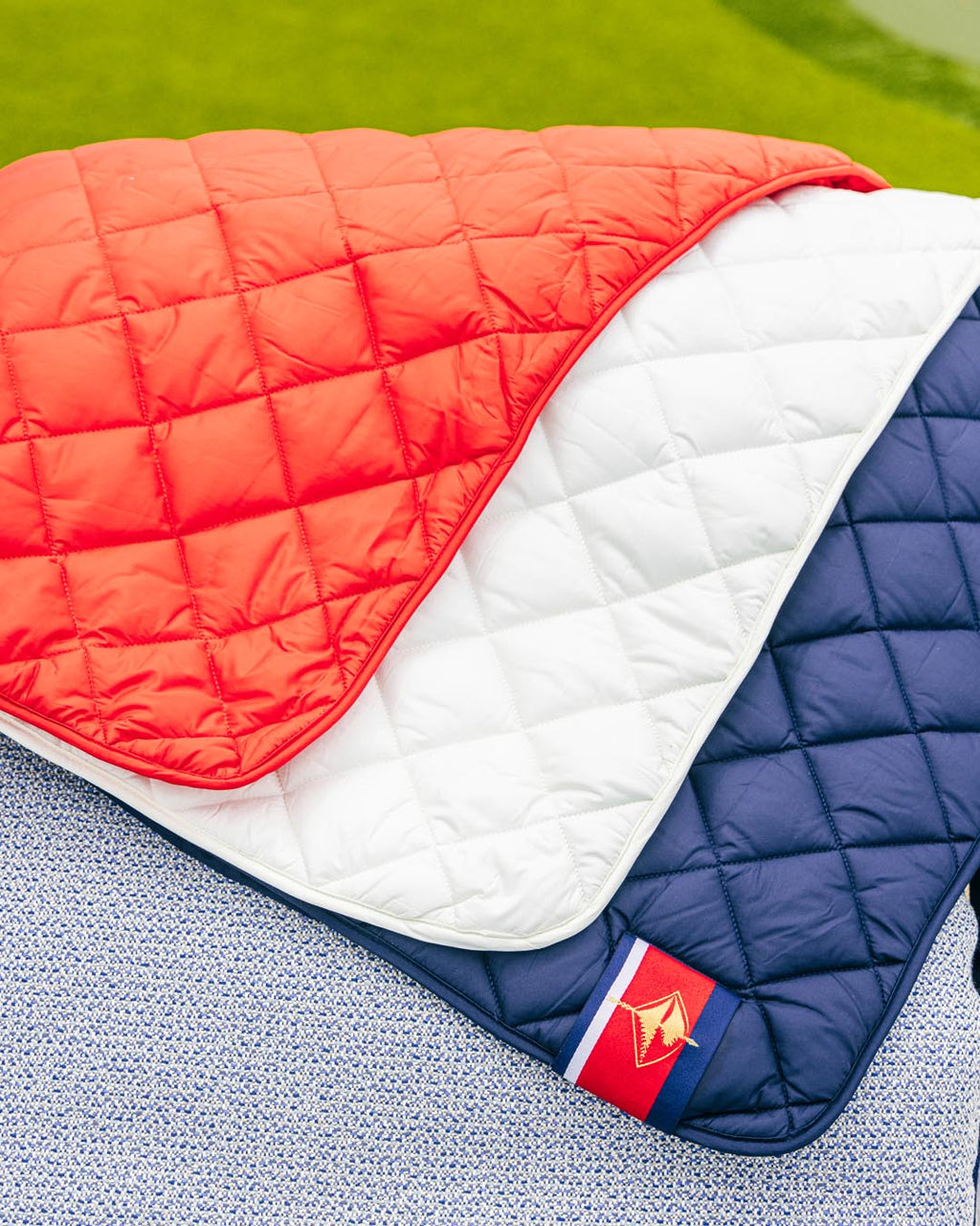 Snuggles: Waterproof Puffer Blanket with Pockets