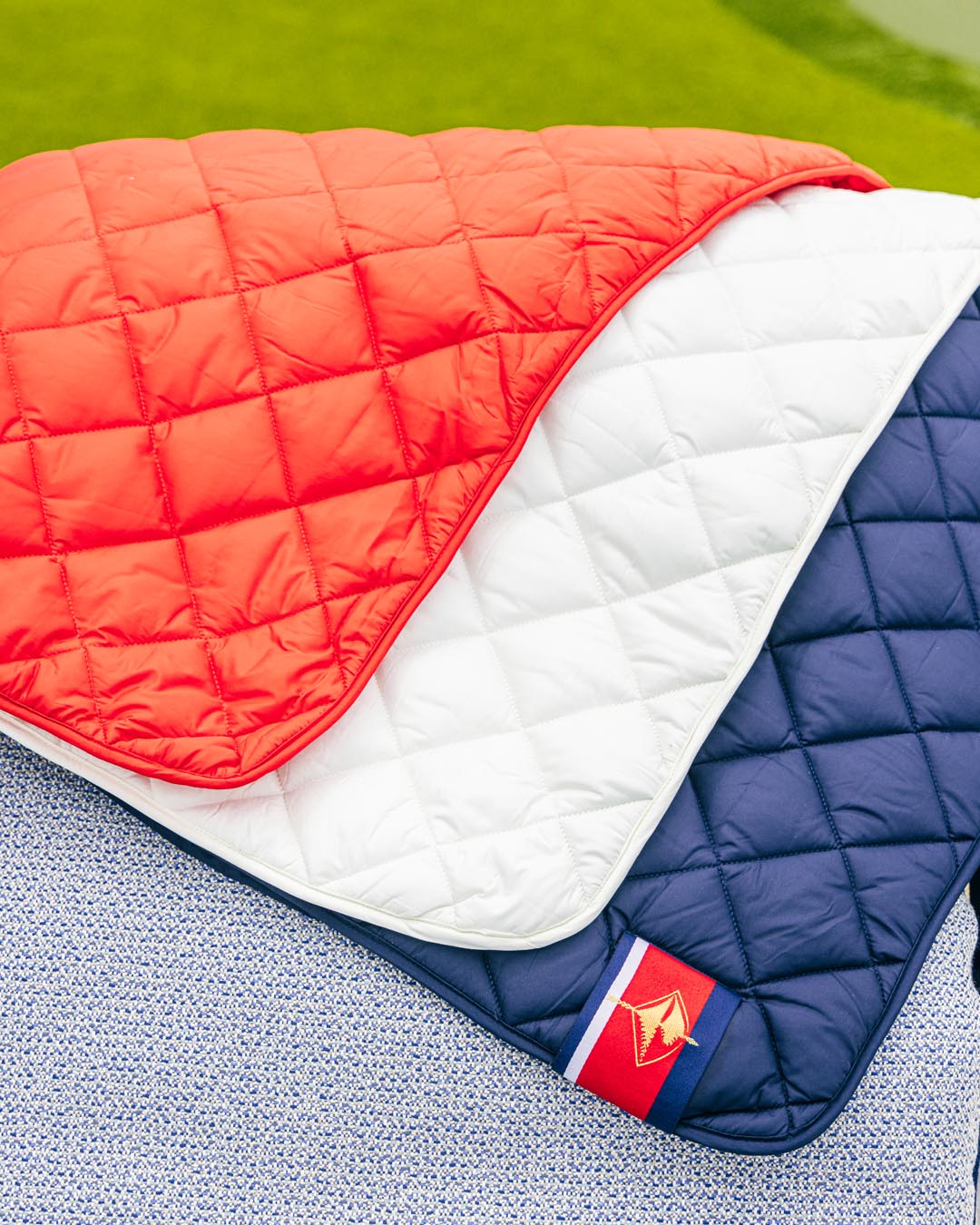 Snuggles: Waterproof Puffer Blanket with Pockets